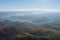 Beautiful landscapes of high mountains in warm autumn in the Carpathians peaks rural meadows countryside