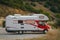 Beautiful and large red camper park in the mountains of Meteora, Greece