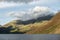 Beautiful late Summer landscape image of Wasdale Valley in Lake District, looking towards Scafell Pike, Great Gable and Kirk Fell