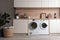 Beautiful laundry room design with modern washer and dryer set