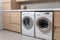 Beautiful laundry room design with modern washer and dryer set