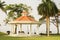 Beautiful lawn with sitting area and decorated pavement at bright day light with selective focus