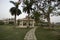 Beautiful lawn with sitting area and decorated pavement at bright day light with selective focus