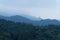 Beautiful layers of blue mountains in mist