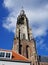 Beautiful leaning tower stands in historical part of Delft