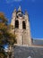 Beautiful leaning tower stands in historical part of Delft