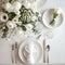Beautiful light beige and white colors morning table decoration tablecloth and napkins, big white roses blossom bouquet, silver