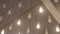 Beautiful light bulbs in large numbers illuminate a large room.