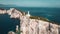 Beautiful lighthouse building at the end of a vertical cliff in Lefkada, Popular tourist destination in Grece