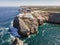 Beautiful lighthouse located on high cliffs of Saint Vincent cape in Algarve, Portugal