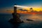 The beautiful Lighthouse Tourlitis of Chora at night. Andros island, Cyclades, Greece