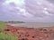 Beautiful like a painting. Stornmy clouded sky over Nightcliff beach, Darwin, NT Australia.