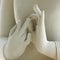 Beautiful Limestone sculpture close-up Hands of Buddha