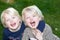 Beautiful little blond identical twins girls