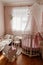 Beautiful little cosy white kids room with two beds for girls kids