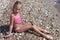 Beautiful little girl in a bikini posing