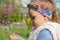 Beautiful little girl blowing dandelion. Cute girl on the medow.