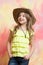 Beautiful little girl in fashion cowboy hat has happy face