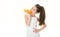 Beautiful little girl with oranges, lemons, grapefruits, vitamin. Baby girl holding a big juicy orange. Little girl