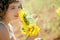 Beautiful little girl in a summer sunflower field