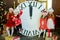 Beautiful little girls with a big clock