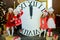 Beautiful little girls with a big clock