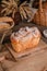 Beautiful loaf of white bread on wooden background