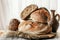 Beautiful loaves of bread on a leaven of white wheat on a plate on the edge of the canvas. Homemade cakes, handmade. Close up