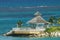 Beautiful lonely gazebo surrounded by the ocean.