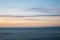 Beautiful long exposure vibrant sunset landscape image of Portland in Dorset England