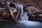 Beautiful long exposure waterfall with rocks in Obersdorf Bavaria