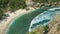 Beautiful long white ocean waves rolling to the sandy Atuh beach. Clear pure transparent water in the lagoon, Nusa