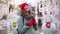 Beautiful lovely middle-aged girl with curly hair warm winter sweater stands background Town Square.