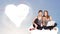 Beautiful lovely women sitting on cloud with heart