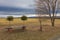 A beautiful lowland landscape overlooking the Palava region. Dark clouds in the sky. Fields and meadows