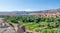 Beautiful lush green oasis with buildings and mountains at Todra Gorge, Morocco, North Africa