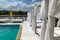 Beautiful luxury outdoor swimming pool with sun beds in hotel for holiday travel