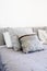Beautiful luxury pillow on sofa decoration in livingroom interior Light Vintage gray colors