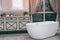 Beautiful luxury vintage empty bathtub Freestanding white bath.