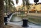 Beautiful Madinat Jumeirah water channel with wooden bridge and palms during sunset.