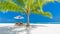 Beautiful Maldives island beach landscape. Chairs and umbrella for summer vacation and holiday background. Exotic tropical beach c