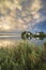 Beautiful mammatus clouds formation over lake landscape immediately prior to violent storm