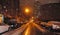 Beautiful Manhattan New York street during massive snowfall at winter night in december.