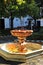 Beautiful marble fountain in the Plaza de Dona Elvira at the famous Santa Cruz neighborhood of Seville, Andalusia, Spain