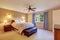 Beautiful master bedroom with carpet and window.