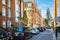 Beautiful Mayfair street with periodic buildings, leading to Hyde Park