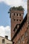 The beautiful medieval Guinigi Tower with holm oak trees on top, Lucca, Tuscany, Italy