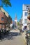Beautiful medieval historic lower rhine village with church, old houses, blue summer sky
