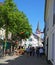 Beautiful medieval historic lower rhine village with church, old houses, blue summer sky