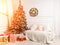 Beautiful Merry Christmas interior. Decorated Christmas tree. Concept of Merry Christmas and New Year